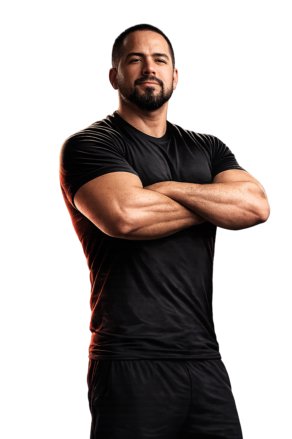 Eddie Fresh, fitness coach, standing with arms crossed